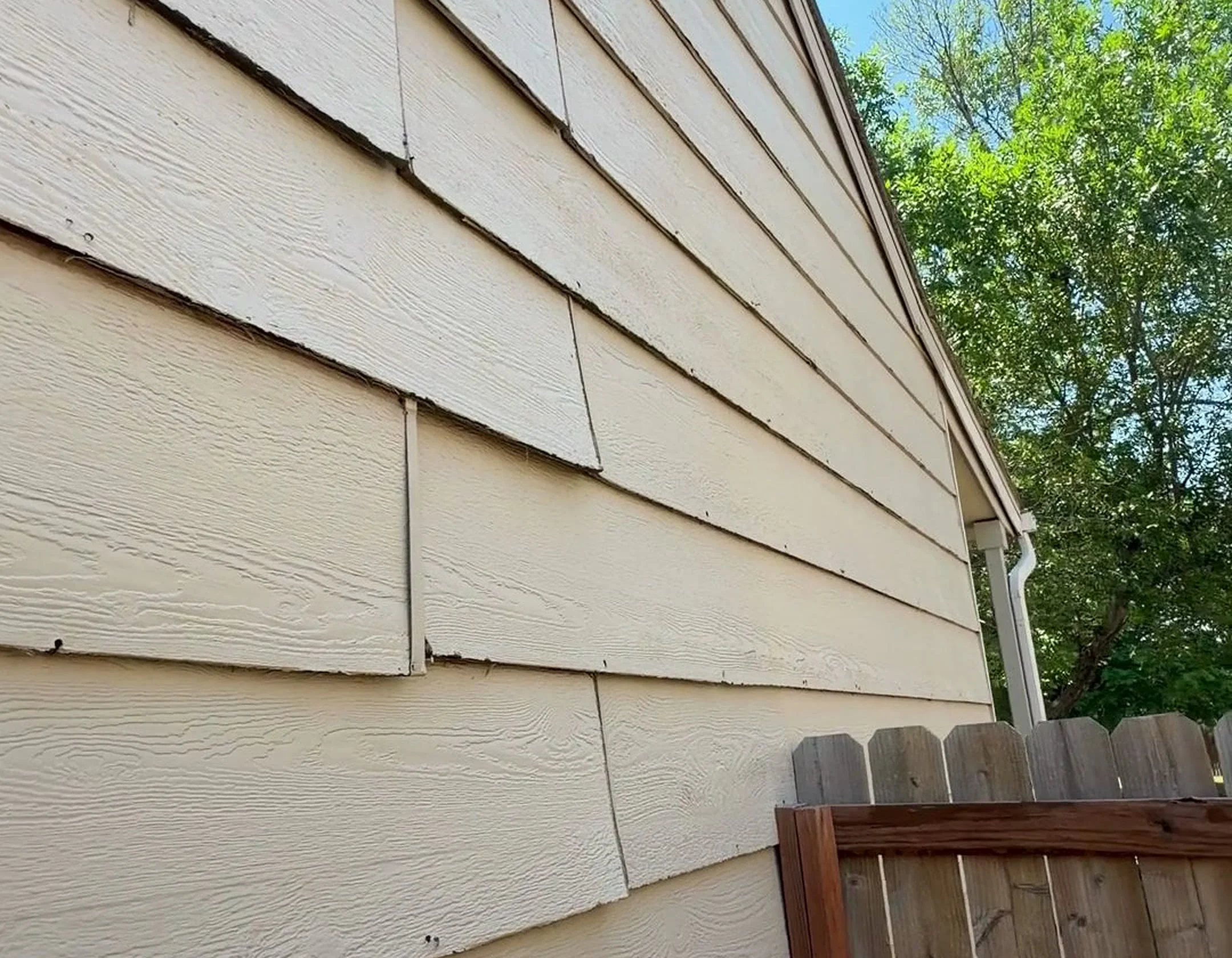 Why Composite Siding Rots (How Paint Prevents It)